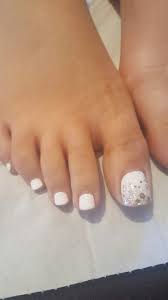 If you want to look lovely and cute, the black and white panda toe nail design is certain to get you noticed in the crowd. Toe Nails Toenail Design Shellac White Glitter Ombre Gradient Wedding Toe Nails Glitter Toe Nails Summer Toe Nails