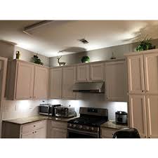 Amazon Com Aiboo Led Under Cabinet Lighting Kit 4 Packs Of 12v Puck Lights With Rf Dimmable Wireless Rf Remote Control For Kitchen Counter Accent Lighting Daylight White Home Improvement