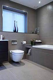 Below are some brilliant ideas for bathroom color schemes you can use for your own bathroom. Your Small Bathroom Would Look More Confined If You Apply Grey Hues In Every Inch Of It Try C Top Bathroom Design Bathroom Interior Design Grey Bathroom Tiles