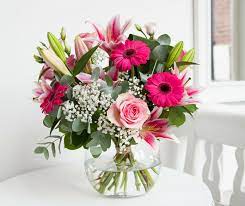 How to arrange flowers in a round vase. How To Choose The Perfect Vase For Your Flowers Interflora