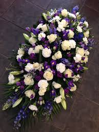 I offer a free home consultation to discuss the funeral i design the funeral flowers and deliver them to the funeral director of choice. Blue And White Casket Spray Funeral Flower Arrangements Funeral Flowers Funeral Floral Arrangements