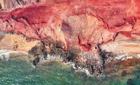 A TRAVEL GUIDE TO HORMUZ ISLAND'S RED BEACH IN IRAN - TPM