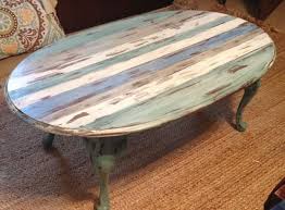 Sometimes it just requires a bright coat of paint. Distressed Beachy Striped Coffee Table Painted Coffee Tables Painted Furniture Coffee Table