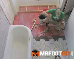 Armstrong premium tile flooring and alterna • install the tile along the chalk lines using tile spacers to maintain desired joint grout width. How To Tile A Bathroom Floor A Diy Guide Mr Fix It Diy
