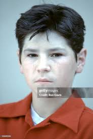 Actor Michael Fishman, D.J. Conner from T.V. show 'Roseanne', poses... News  Photo