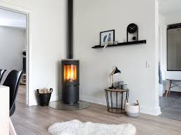 A sleek scandinavian morso wood stove replaced the previous unit, which had been situated so that its stovepipe blocked views from the kitchen and dining room. Heta Wood Stoves Danish Design And Quality More Than 150 Years