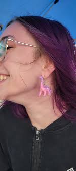 Check out these sweet earrings the lovely lotus barista was sporting at  SPIN FOR A CAUSE! #spinforacause. I'm counting this as finding a dinosaur  in Fairbanks. 😁