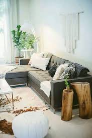 A Boho Chic Space With A Large Grey Secctional Sofa That Makes The Base Of The Room Rooms Home Decor Living Room Sectional Living Room Carpet