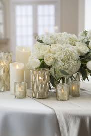 Flameless Candles For Wedding Reception 9 Awesome Ideas Flameless Candles Wedding Candle Wedding Centerpieces Wedding Table Decorations Candles