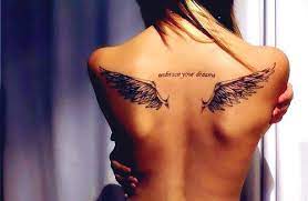 35 Breathtaking Wings Tattoo Designs Tattoos Girl Tattoos Time Tattoos