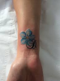 All of the hundreds of flowers in the myosotis genus can be called forget me nots. 25 Lovely Forget Me Not Flower Tattoo Designs Entertainmentmesh