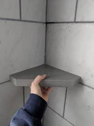 Given that that's not an option since the stall's already tiled, is it possible or recommended to install a porcelain when i demo'd the 2 showers in my old house, that is how all the shelves were attached. Retrofit Shower Corner Shelf Diy Home Improvement Forum
