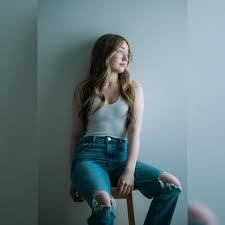 Blue eyes, freckles, simple style, and great light...what more can you ask  for?! Let Sarah know what you think, everybody!!!