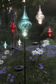 Spring Fever Wondrous Outdoor Lighting For 2017 Outdoor Lighting Ideas Www Lightingstore Lightingsto Glass Garden Art Solar Garden Stakes Fairy Garden Diy