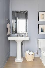 blue wall over pedestal sink