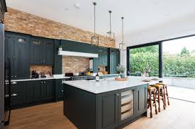 The cupboards are still available as a possible reward. Dark Green Cabinets Add Elegance To A Welcoming Kitchen