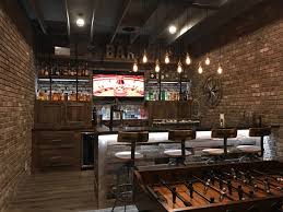 Industrial basement renovation includes a conversation sitting area and game room, bar, pool table, cabinet(if you're a beginner, then use best sander for cabinets. Industrial Basement Industrial Keller Atlanta Von Jr Custom Living Houzz