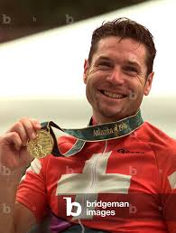 Image of Pascal Richard of Switzerland is all smiles as he displays