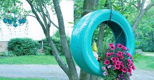 Justaz.com productions, with just az gardens, set up a tire garden. She Drills A Hole Into The Bottom Of An Old Tire For The Perfect Diy Backyard Upgrade Littlethings Com
