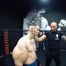 Russian idiot destroys his body with Synthol. Fights MMA. - Eric Zane Show