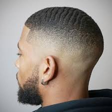 In fact, this hairstyle, which features a cropped back and sides with longer hair on the. Pin On Black Men Haircuts