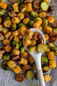 Sheet Pan Sweet Potato Gnocchi Dinner Dash Of Mandi Recipe Sweet Potato Gnocchi Chicken Sausage Recipes Recipes