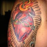 Price and other details may vary based on size and color. Tatuaje Ne Color En El Hombro Corazon Sagrado Tattooimages Biz