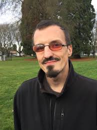 Kris McAlister — helping homeless at policy table and