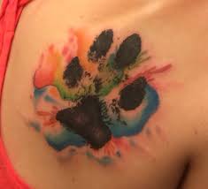 Paw Print Tattoo Watercolor Tattoo Like The Not Outined Look And Not Solid Paw Print Also Like The Colors From Left T Print Tattoos Dog Tattoos Pawprint Tattoo