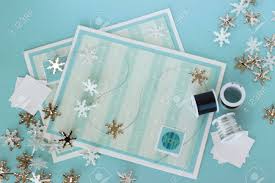 We stock a massive range of card making supplies, which include card toppers, card blanks, embellishments, decoupage, peel off outline stickers, mulberry shapes, card making kits, die cut shapes, scrapbooking kits. An Image Of Two Hand Made Greeting Cards With A Winter Theme With Card Making Supplies Including Snowflake Shaped Brads And Craft Wire Stock Photo Picture And Royalty Free Image Image 17443903