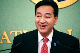 Japan minister aims to control COVID while achieving growth