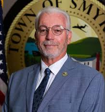 Brian D. Hercules has announced his retirement as Town Manager of Smyrna  after nearly six years of dedicated service. “It has been a privilege to  work with the people of the Town