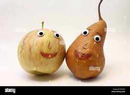 Funny Pair Of Fruits Apple And Pear With Eyes Stock Photo Alamy