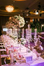 White Floral Decor Tall Candelabras Crown Shaped Place Card Holders And Carriage Shaped Door Gif White Floral Decor Wedding Centerpieces Wedding Decorations