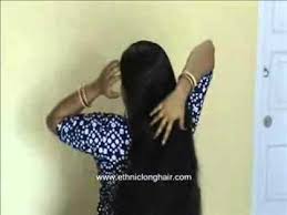 A beautiful young indian woman standing from front with her long black hair waist up, isolated for white background full length portrait of beautiful brunette young girl with black long straight hair in white dress standing and sending air kiss. Long Hair Indian Women Video