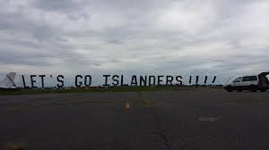 Into the Wild Blue Yonder: Let's Go Islanders Banner soars over Toronto