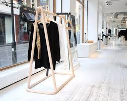 Minimal Store Retail Design Clothing Rail Unique Wood Flooring Retail Design Retail Store Layout Design