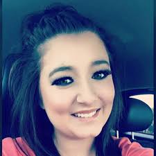 Teacher killed by stray bullet while sitting