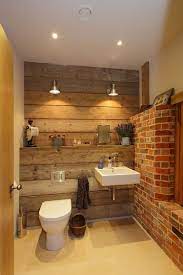 A must for the modern décor bathroom. Rustic Bathroom With Reclaimed Wood And Exposed Brick Walls Design Hampshire Light Country Style Bathrooms Rustic Bathroom Designs Rustic Bathrooms