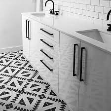 A matte black finish provides a soft sheen and is a great contrast against white cabinets. Cement Tile Shop On Instagram What S Black And White And Cool All Over Repost B Mort W Black Kitchen Handles Black Kitchen Door Handles Black Kitchens