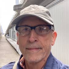 This is what the ideal neighborhood looks like: housing for all types in a  walkable area (where everyone can still own a car), within walking distance  of a train and bus station.