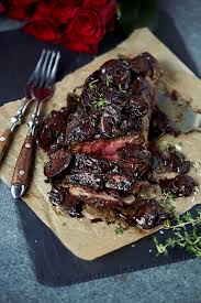 Easy to make with a restaurant trick for an extra tasty gravy! Cast Iron Ribeye Steak W Red Wine Mushroom Sauce Paleo Recipes
