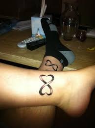 The infinity roses are placed in the same spots on the body. Couple Tattoos Tumblr Infinity Tattoos Friend Tattoos Couple Tattoos