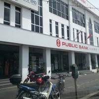 The square has a water feature. Public Bank Jalan Kebun Sultan