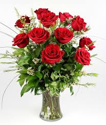 12 large red roses in clear glass vase that bulbs out at the bottom if possible. 12 Long Stem Red Roses In Saint Paul Mn Iron Violets Design Studio