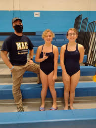 Good luck to all the swimmers that swam today and will be swimming tomorrow  at WHAT First Spalsh. Here are Riley and Bella two of our swimmers with  Coach D!!!