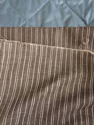 An armchair, coffee table decorations, flower basket, rug, and a fireplace top, are popped due to the clear background. Vintage Brown And White Striped Fabric Sewing Fiber Craft Supplies Tools Vadel Com
