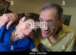 FOR USE MONDAY, JUNE 6 ** This June 4, 2009 photo shows Candy Adcock, left,  and Steve McNutt in Ann Arbor, Mich. The couple, who have advanced stage  cerebral palsy, exchanged