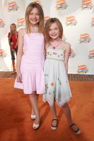 Dakota fanning and elle fanning pictures. Elle Fanning S Fashion Evolution From Dakota S Little Sister To Vogue Cover Girl Vogue