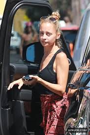 Nicole Richie wearing a printed skirt with a cropped top as she makes a  quick stop in Venice Beach - AZNude